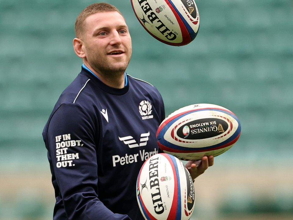 LONDON, ENGLAND - FEBRUARY 03:  Finn Russell juggles rugby balls during the Scotland captain's run at Twickenham Stadium on February 03, 2023 in London, England. (Photo by David Rogers/Getty Images)