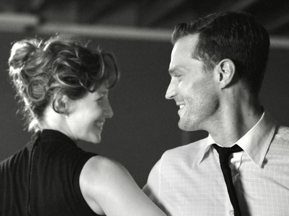 Caitríona Balfe as Ma with Jamie Dornan in Belfast.