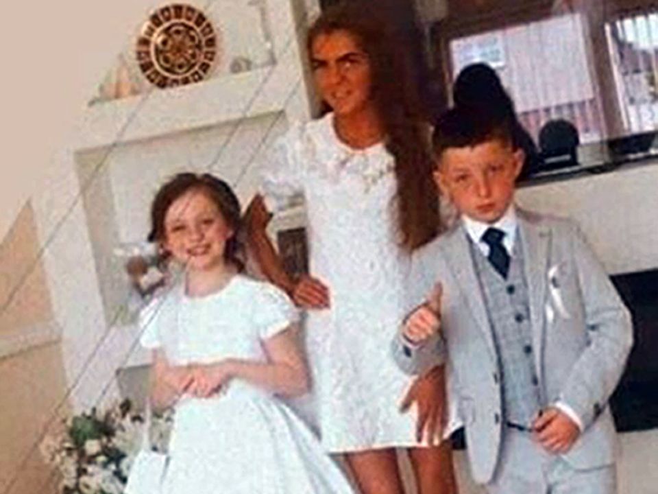 Lisa Cash, 18, and her two younger siblings, eight-year-old twins Christy and Chelsea Cawley