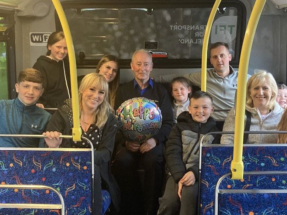 Tommy McGuirk with his family on his last day of work at Dublin Bus Pic: Twitter/MichelleGrehan