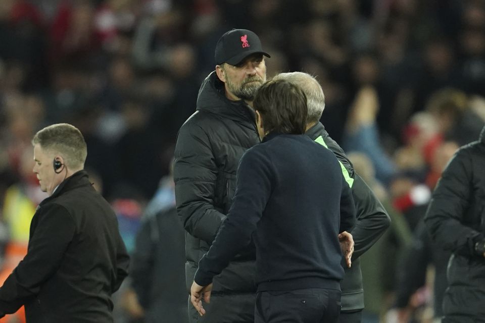 Jurgen Klopp, left, and Antonio Conte shake hands at the end of Saturday’s match (Jon Super/PA).