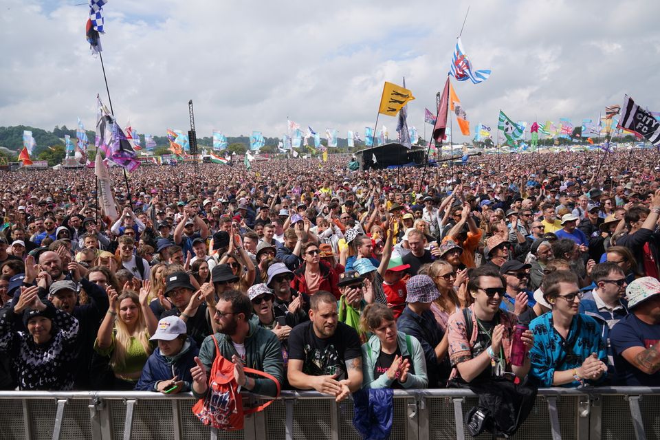 A massive crowd enjoys the sunshine as The Libertines perform on the Other Stage (Yui Mok/PA)