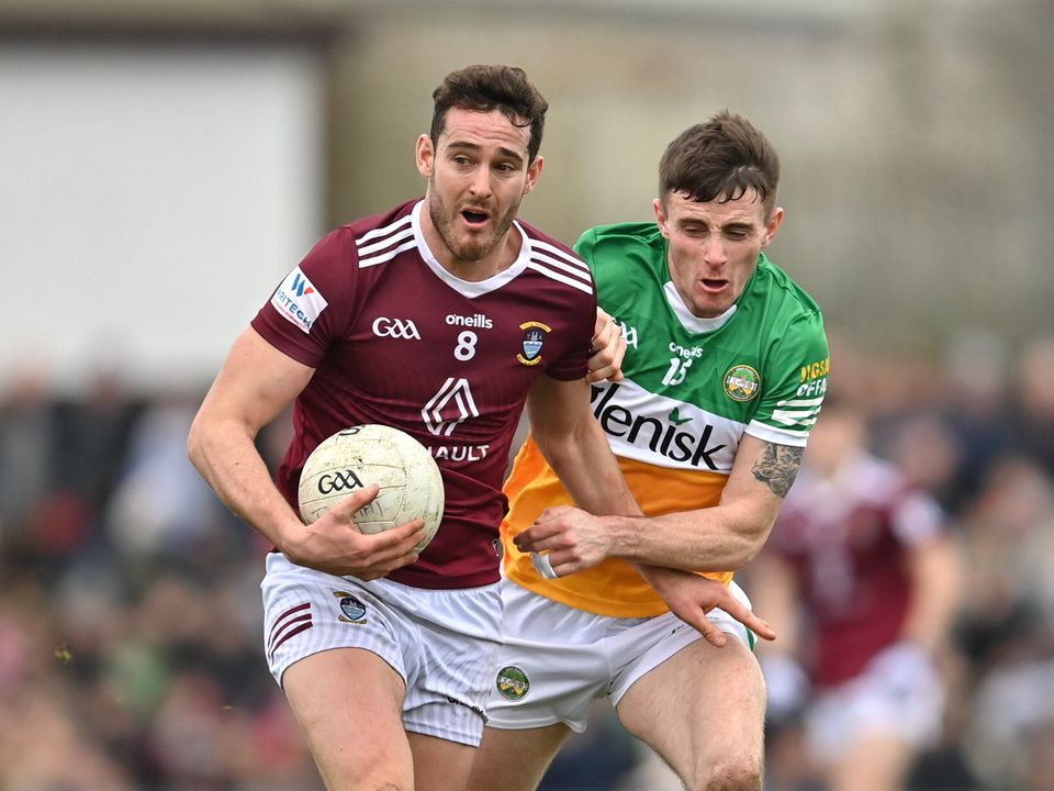 Sam Duncan of Westmeath in action against Dylan Hyland of Offaly. Photo: Stephen Marken/Sportsfile