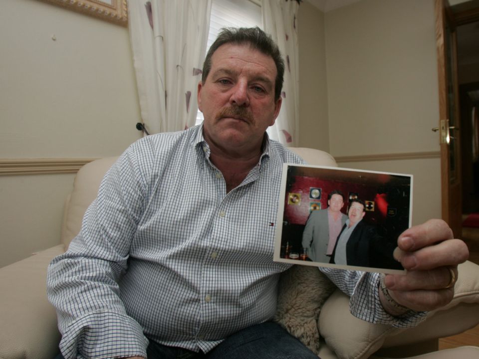 Stephen Collins, the father of Roy Collins, who was shot dead in Limerick pictured with a photograph of him Pic. Brian Arthur/ Press 22