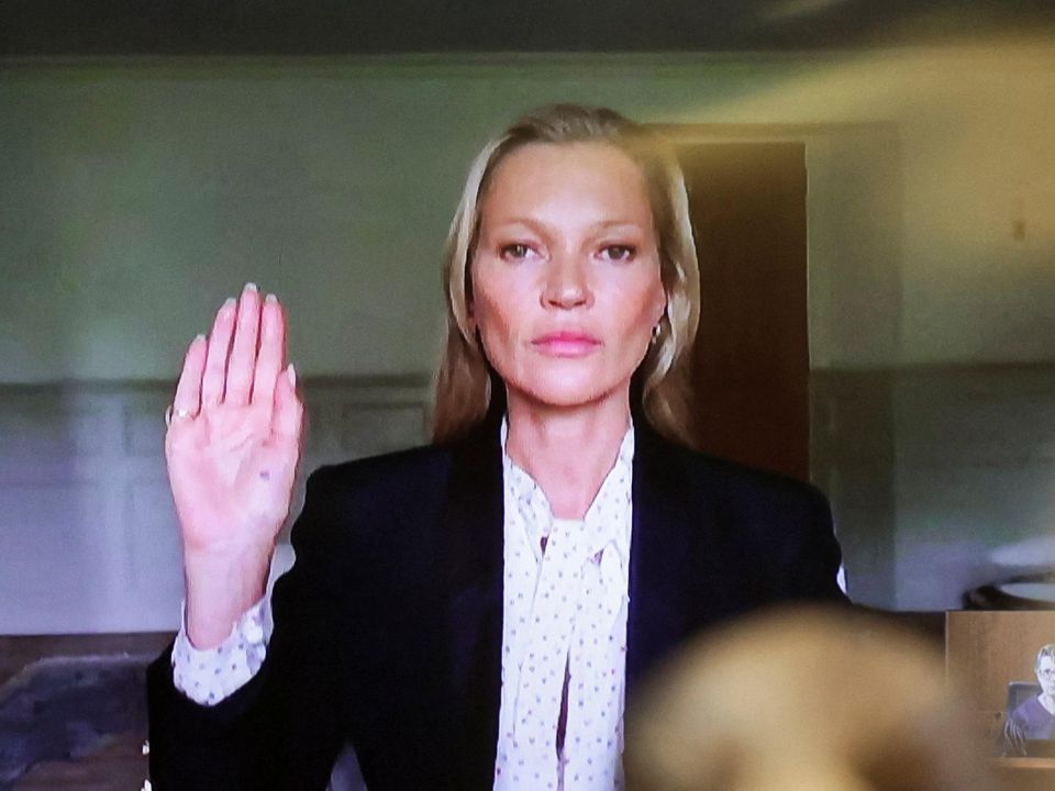Model Kate Moss, a former girlfriend of actor Johnny Depp, is sworn in to testify via video link during Depp's defamation trial against his ex-wife Amber Heard. Picture: Reuters