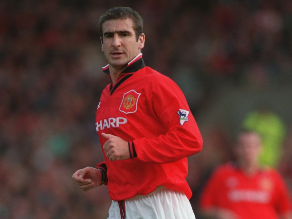 Eric Cantona in action for Manchester United. Photo: Shaun Botterill