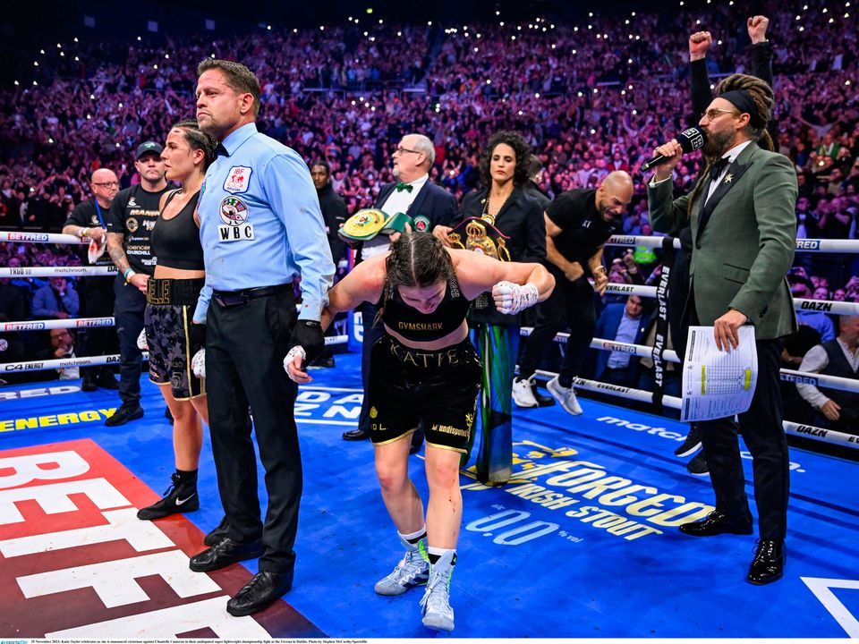 25 November 2023; Katie Taylor celebrates as she is announced victorious against Chantelle Cameron in their undisputed super lightweight championship fight at the 3Arena in Dublin. Photo by Stephen McCarthy/Sportsfile