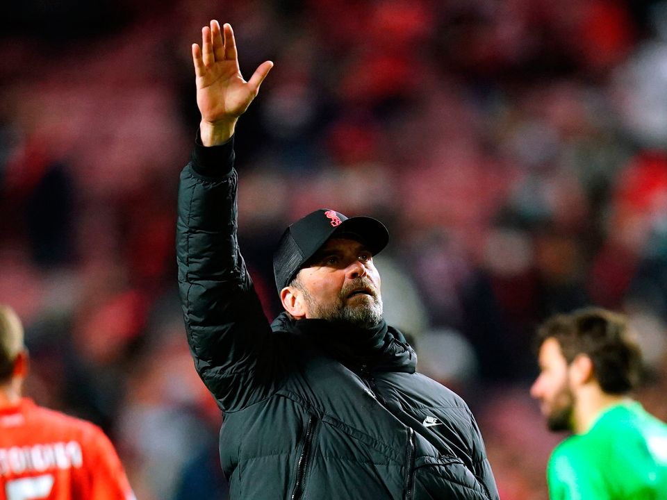 Liverpool manager Jurgen Klopp salutes the fans following the Champions League quarter-final first leg win over Benfica at the Estadio da Luz, Lisbon