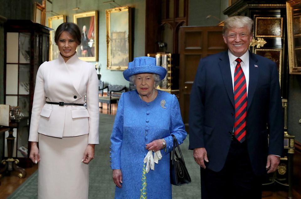 The Queen stands with then-US President Donald Trump and his wife, Melania at Windsor in 2018 (Steve Parsons/PA)