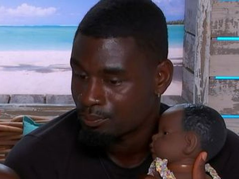 Dami proved his parenting skills during the baby doll task