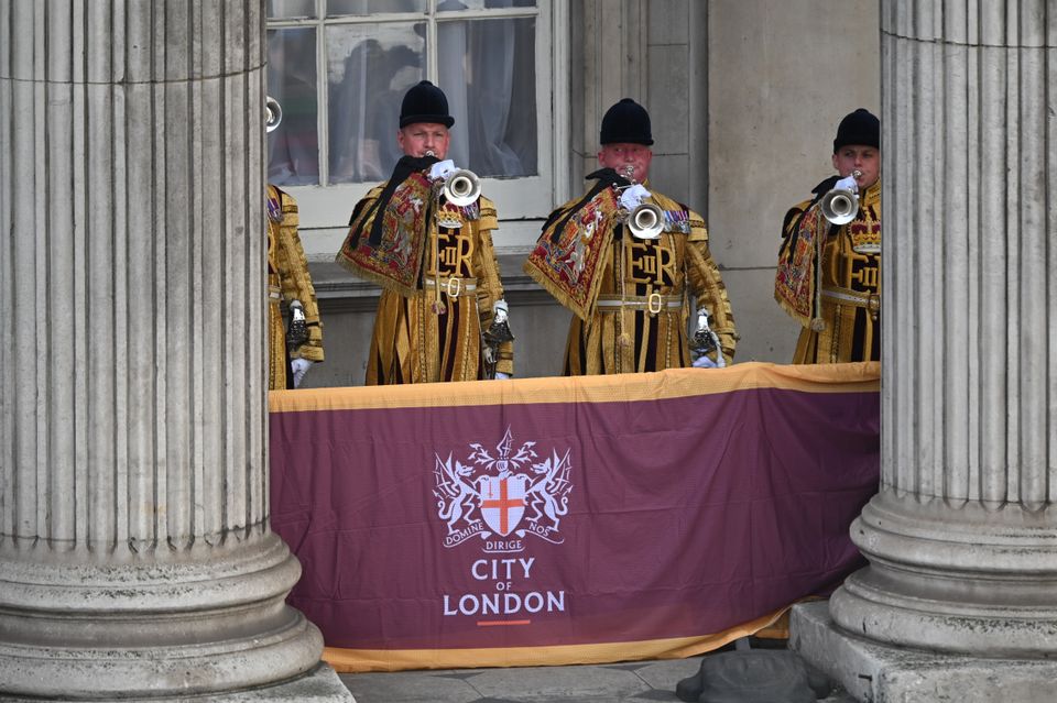 Trumpeters sound a Royal Salute during the Proclamation of Accession of King Charles III at the Royal Exchange in the City of London. Picture date: Saturday September 10, 2022.