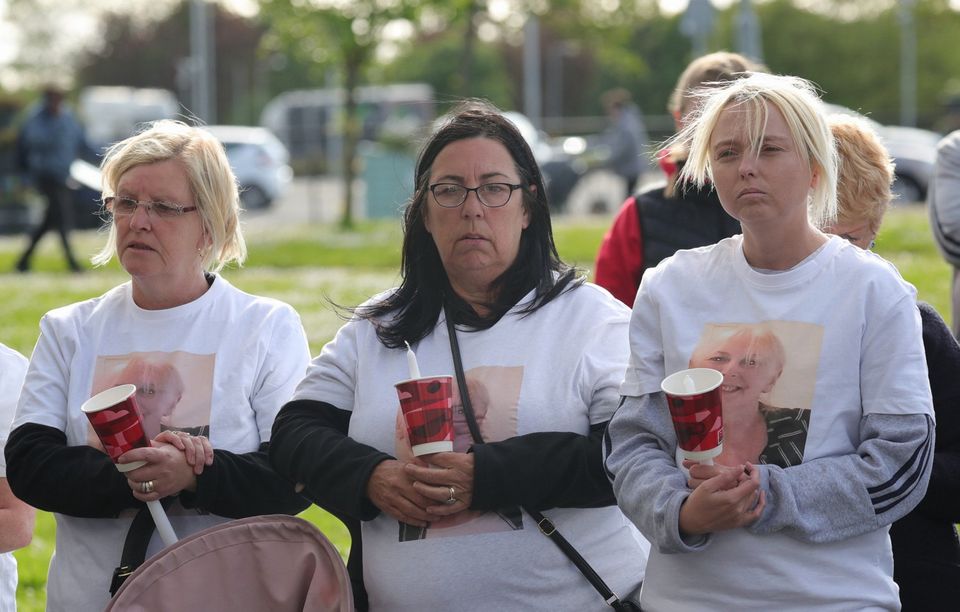 Family and friends of Lisa Thompson attend a candle lit vigil and a minute's silence outside the Axis centre in Ballymun