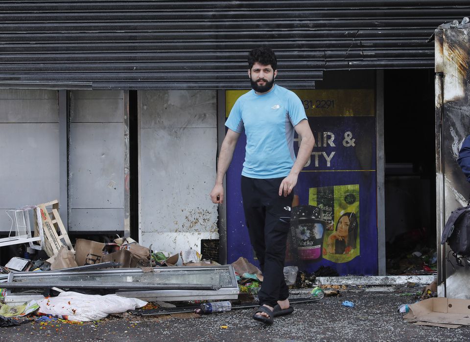 Jamal Ghabes last week in the burnt-out shop where he worked as a butcher