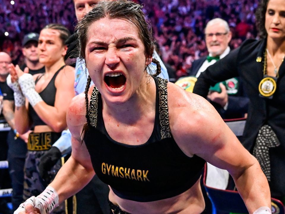 25 November 2023; Katie Taylor celebrates defeating Chantelle Cameron in their undisputed super lightweight championship fight at the 3Arena in Dublin. Photo by Stephen McCarthy/Sportsfile