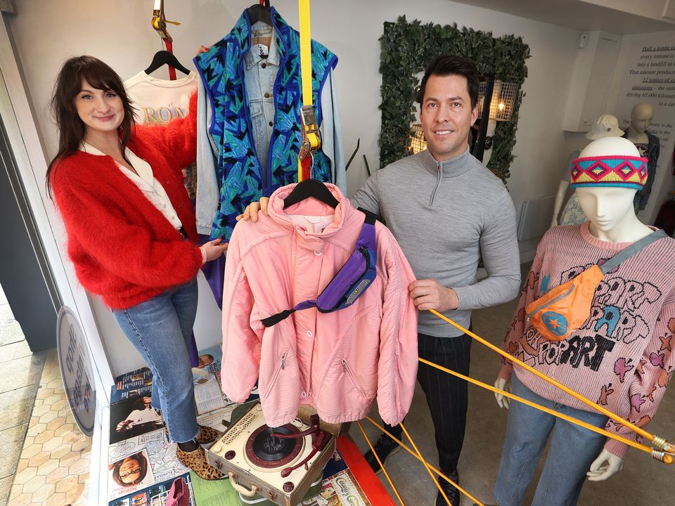 Kate McLoughlin and Paulo Almeida arrange an eye-catching window display at the Capel Street store