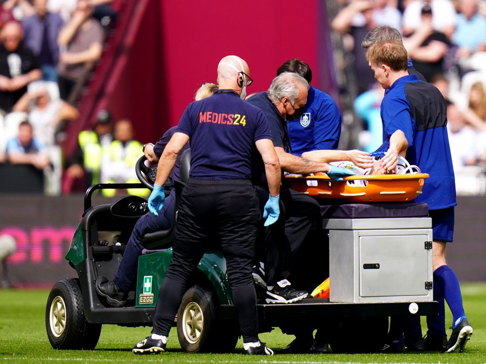 Burnley’s Ashley Westwood leaves the pitch on a stretcher (Adam Davy/PA)