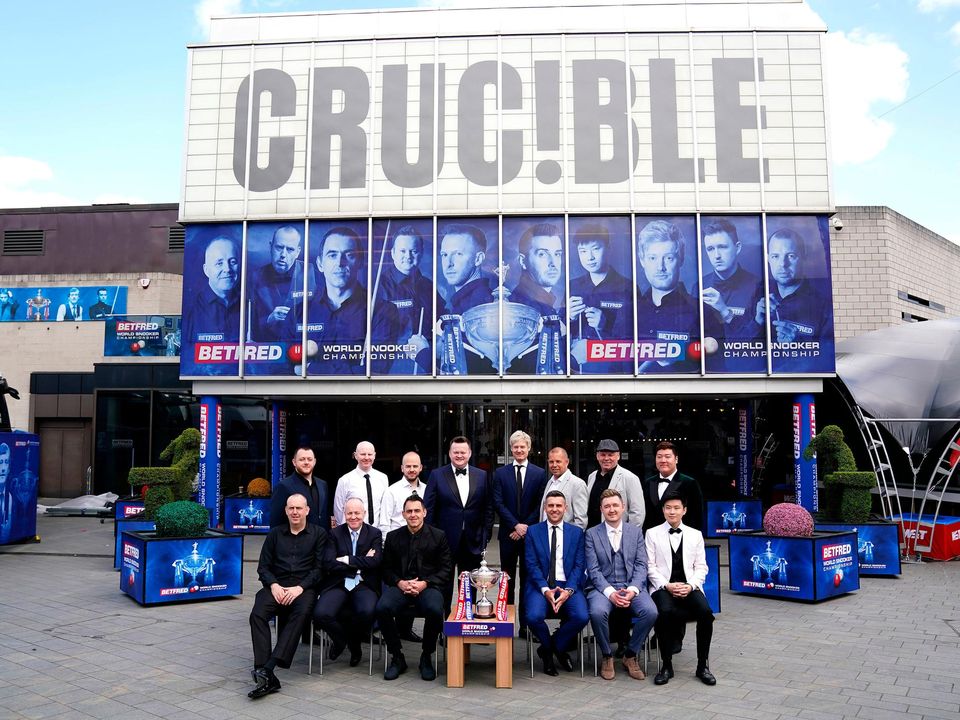 (Back to front, left to right) Mark Allen, Anthony McGill, Luca Brecel, Shaun Murphy, Neil Robertson, Barry Hawkins, Stuart Bingham, Yan Bingtao, Mark Williams, John Higgins, Ronnie O'Sullivan, Mark Selby, Kyren Wilson and Zhao Xinong during the World Snooker Championship media day at The Crucible, Sheffield. Photo credit: Zac Goodwin/PA Wire.