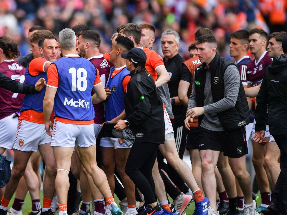 Players and officials from both sides become embroiled as they make their way to the dressing rooms after full time ended in a draw at the GAA Football All-Ireland Senior Championship Quarter-Final match between Armagh and Galway. Photo: Ray McManus/Sportsfile