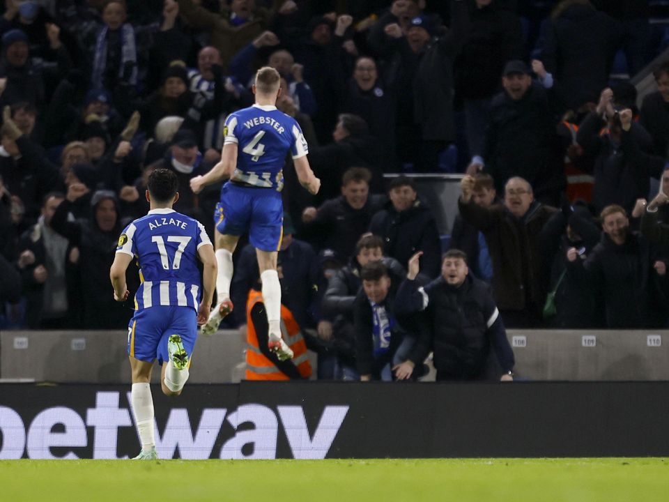 Adam Webster led the celebrations after his goal earned a draw against Chelsea (Steve Paston/PA)