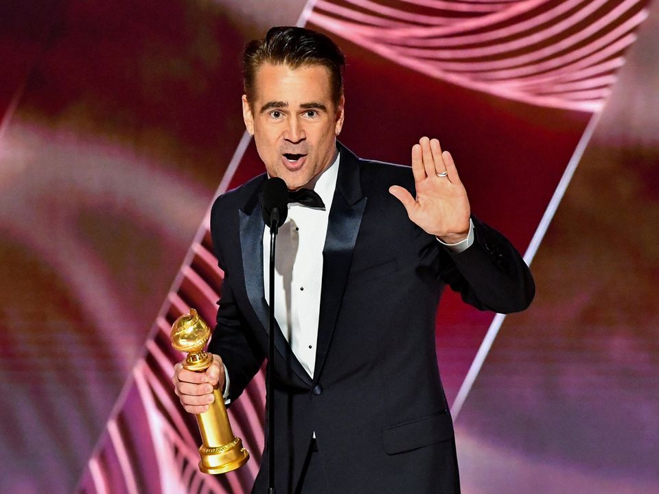 Best Actor, Musical or Comedy, Colin Farrell, The Banshees of Inisherin holds an award on stage at the 80th Annual Golden Globe Awards. Credit: Reuters