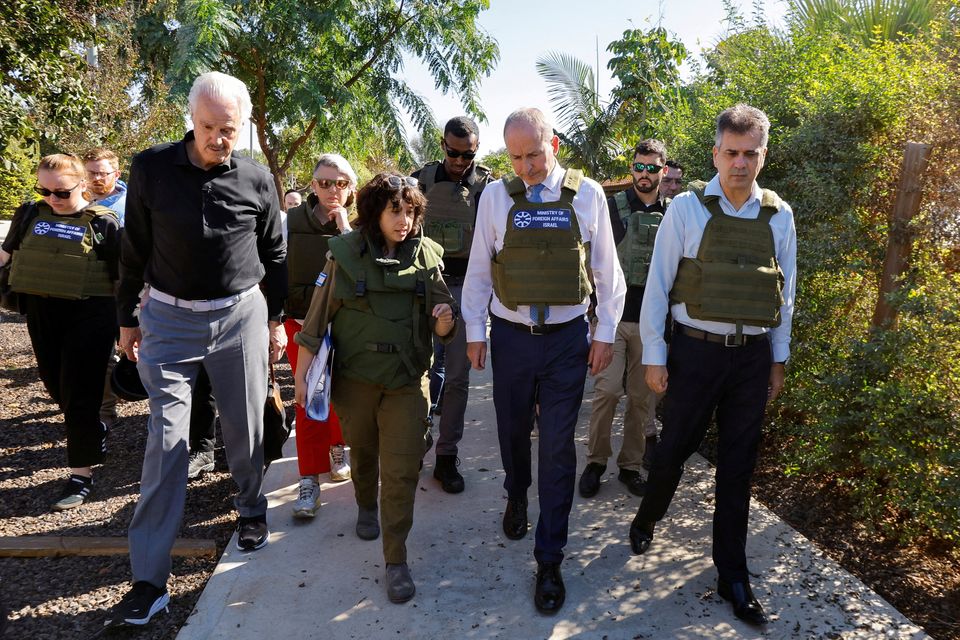 Tánaiste Micheál Martin and Israeli foreign minister Eli Cohen, right, visit Kibbutz Beeri to see the damage that the community sustained after the October 7 attack by Hamas. Photo: Reuters