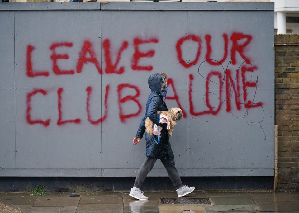 Graffiti close to Stamford Bridge shows the strong feelings around the situation at Chelsea (Yui Mok/PA)