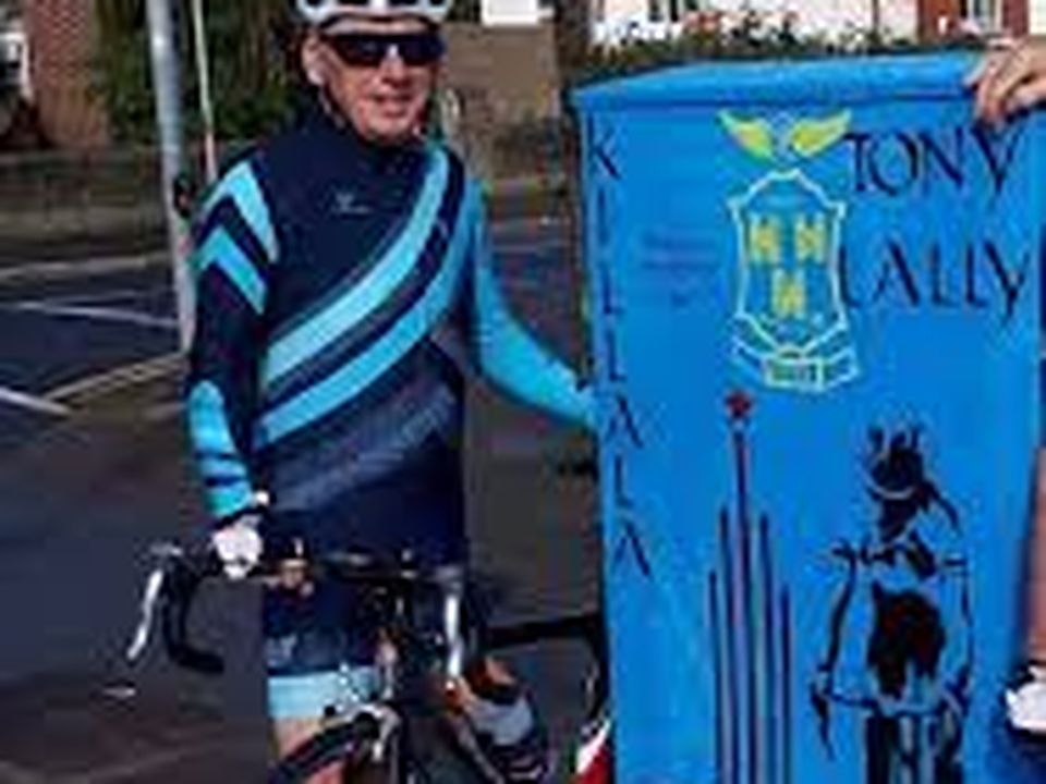 Lally pictured with a mural of him in Dublin