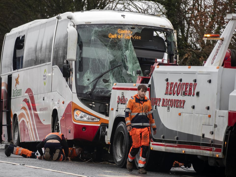 The bus which crashed on Wednesday in Moate, Co Westmeath, is towed from the scene yesterday morning. Photo: Colin Keegan/Collins