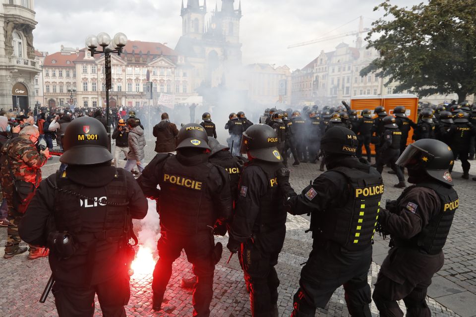Police confront demonstrators in Old Town Square in Prague (Petr David Josek/AP)