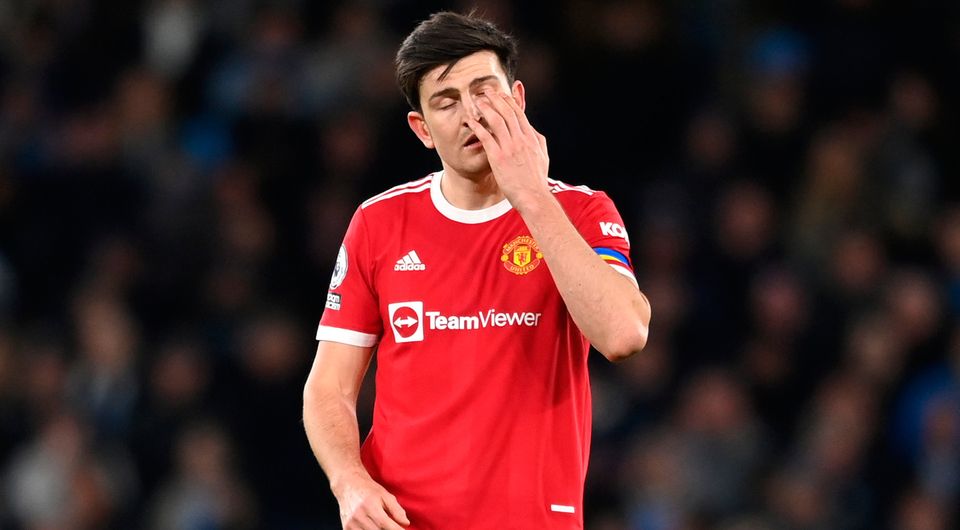 Harry Maguire of Manchester United looks dejected during the Premier League match between Manchester City and Manchester United at Etihad Stadium. (Photo by Michael Regan/Getty Images)