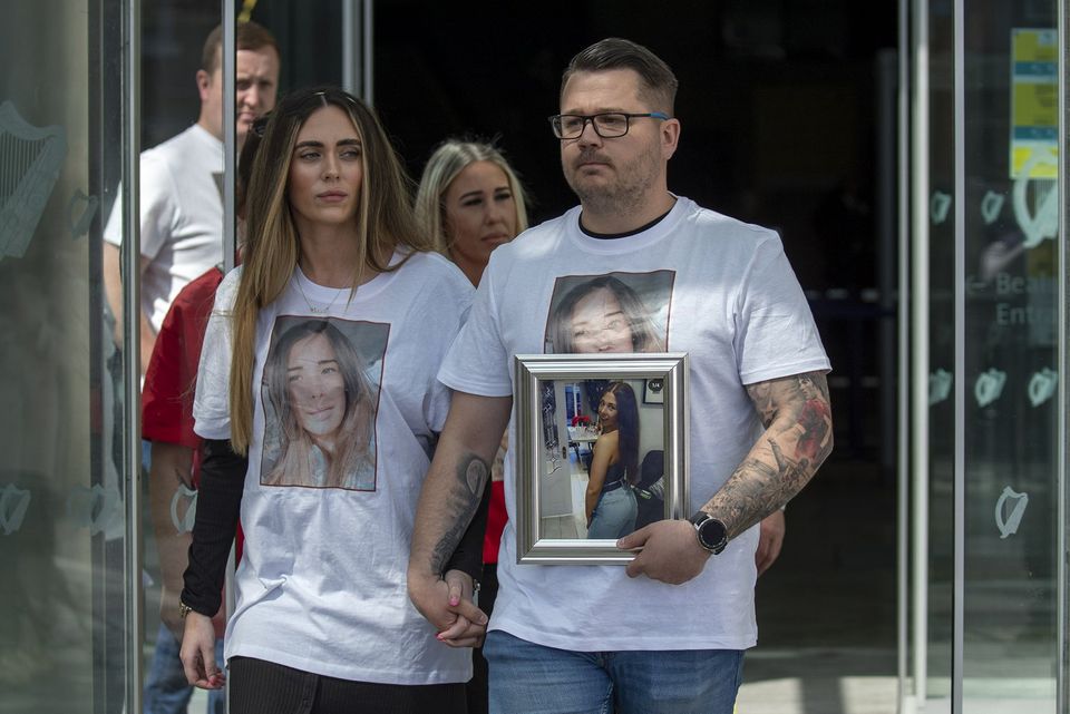 David Poole, holds a framed photo of his murdered sister, Jennifer, as he leaves the Central Criminal Court yesterday (FRI) after Gavin Murphy received a life sentence for murdering Jennifer Poole, in April 2021. PIC: Collins Courts