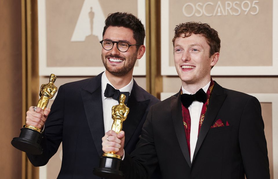 Tom Berkeley and Ross White pose with the Oscar for Best Live Action Short Film for "An Irish Goodbye" Photo: Reuters/Mike Blake