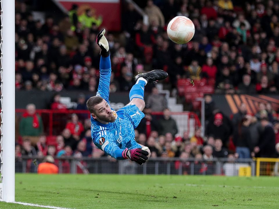 MANCHESTER, ENGLAND - APRIL 13: goalkeeper David de Gea of Manchester United controls the ball during the UEFA Europa League quarterfinal first leg match between Manchester United and Sevilla FC at Old Trafford on April 13, 2023 in Manchester, United Kingdom. (Photo by Michael Zemanek/DeFodi Images via Getty Images)