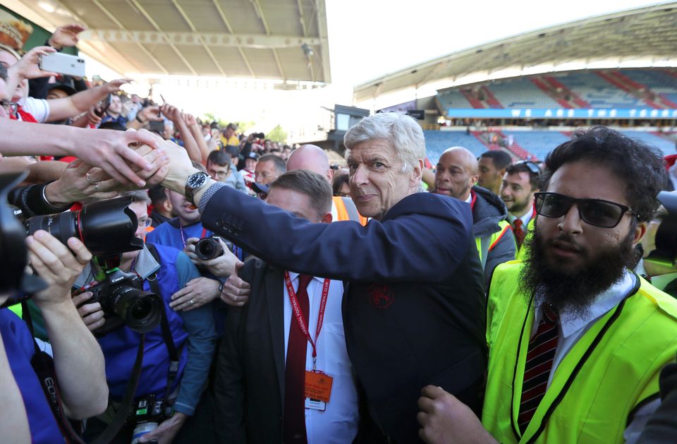 Arsene Wenger says goodbye to Arsenal fans after his final match at Huddersfield (Mike Egerton/PA)