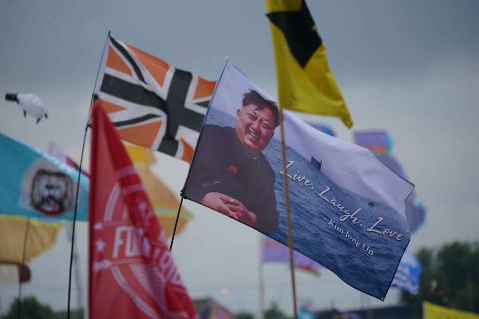 There was the usual array of weird and wonderful flags, including this one featuring Kim Jong-un (Yui Mok/PA)