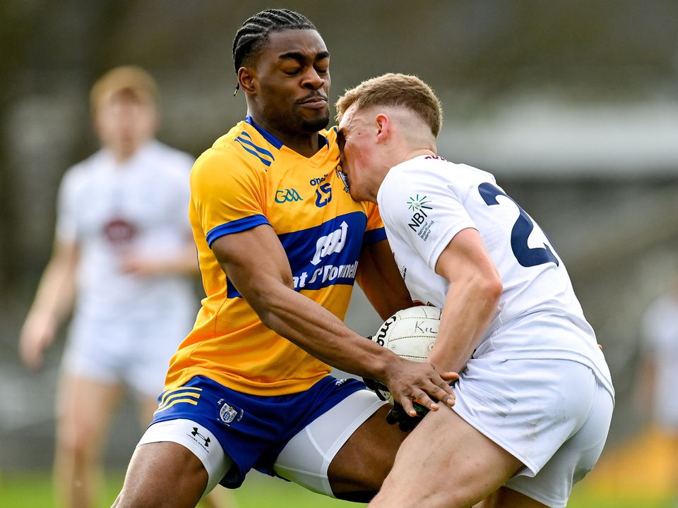 19 February 2023; Paddy Woodgate of Kildare in action against Iken Ugwueru of Clare during the Allianz Football League Division Two match between Clare and Kildare at Cusack Park in Ennis, Clare. Photo by Seb Daly/Sportsfile