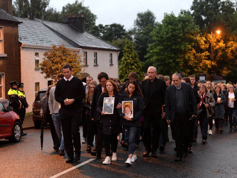 The local community make their way through Multyfarnham for a vigil for Lynn Egar's children Thelma (5) and Michael (2). Photo: Caroline Quinn