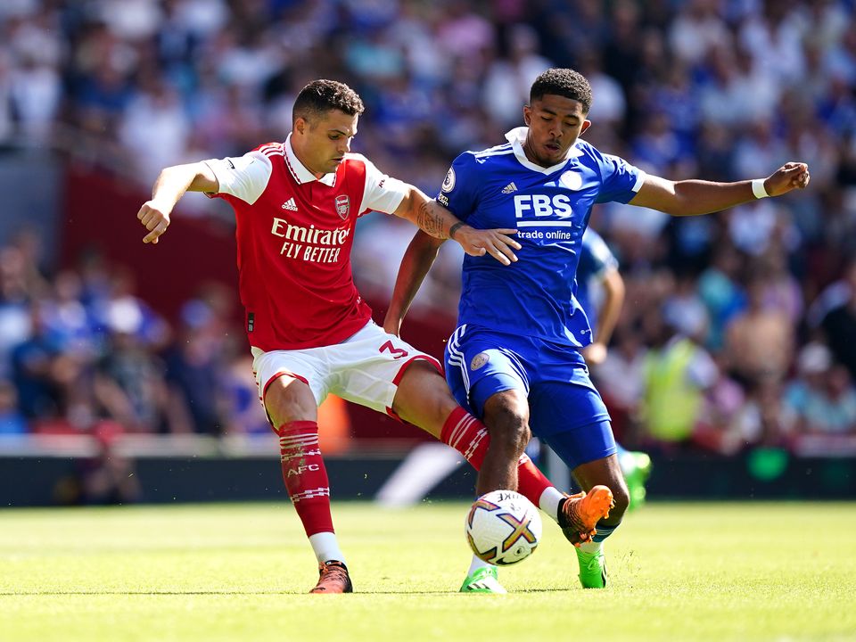 Arsenal's Granit Xhaka (left) and Leicester City's Wesley Fofana battle for the ball during the Premier League match at the Emirates Stadium, London. Picture date: Saturday August 13, 2022.