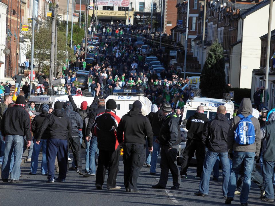 Polish supporters face off against the PSNI at Windsor Park