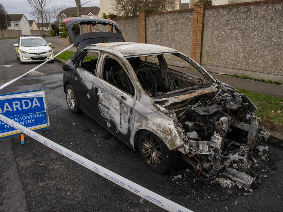 Barry Wolverson  had been shot dead and his killers made their getaway before burning their car