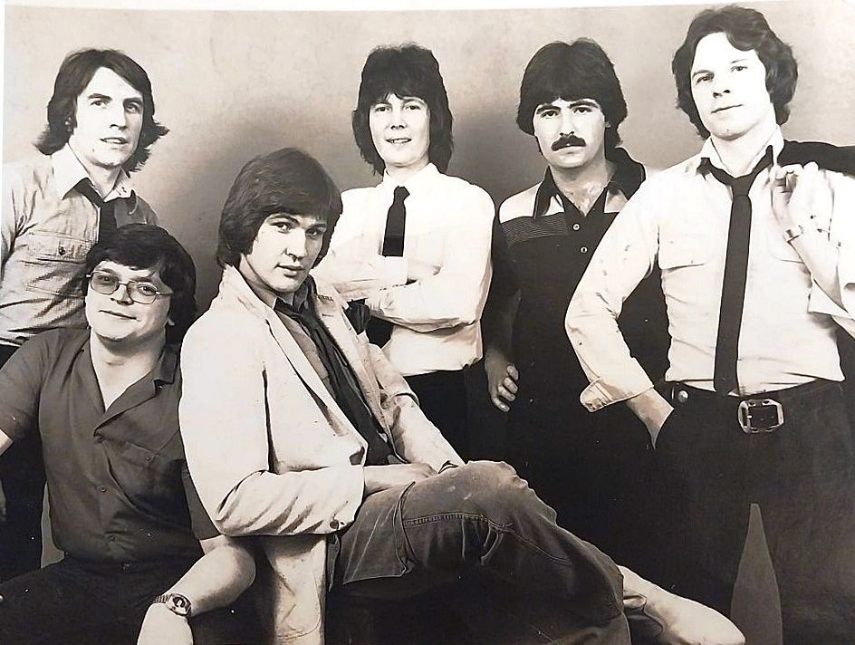Johnny with Danny (top left) and the band