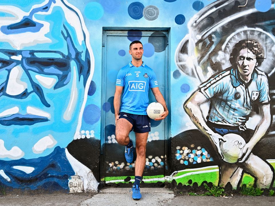 Dublin's James McCarthy stands for a portrait in Ballybough beside murals of Kevin Heffernan and Anton O'Toole, at the launch of AIG’s new Injury Cash product. Photo: Sam Barnes/Sportsfile