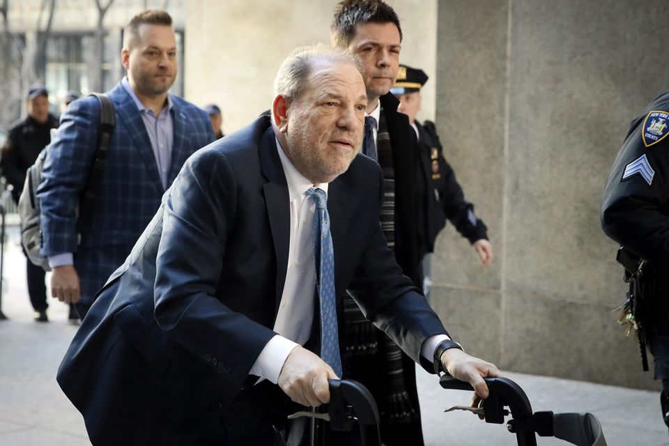 FILE - Harvey Weinstein arrives at a Manhattan courthouse as jury deliberations continue in his rape trial in New York, on Feb. 24, 2020.  (AP Photo/John Minchillo, File)