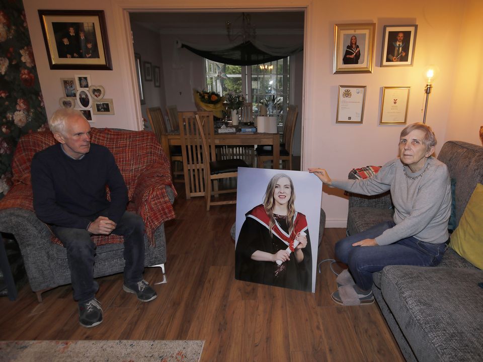 Natalie McNally's parents, Noel and Bernie, with a picture of their tragic daughter