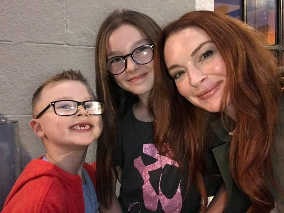 Abbie Hegarty and her cousin Max with actress Lindsay Lohan at The Bridge Tavern. Picture: Sasha Hegarty