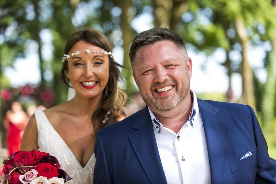 Zoe Holohan and Brian O’Callaghan-Westropp on their wedding day. Photo: Andrzej Chorazyczewski