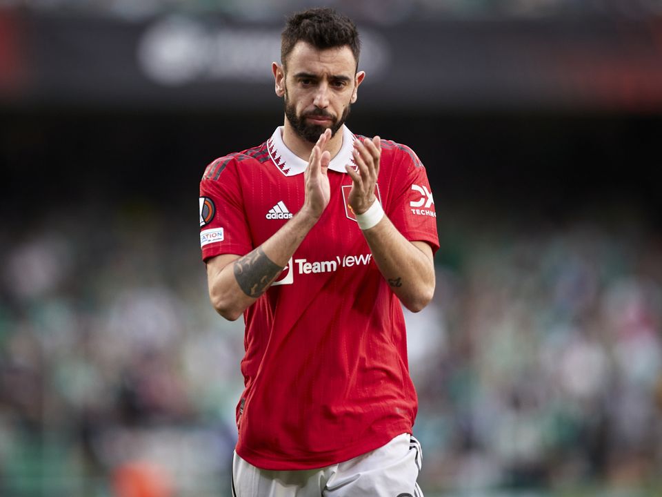 SEVILLE, SPAIN - MARCH 16: Bruno Fernandes of Manchester United applauds the fans during the UEFA Europa League round of 16 leg two match between Real Betis and Manchester United at Estadio Benito Villamarin on March 16, 2023 in Seville, Spain. (Photo by Fermin Rodriguez/Quality Sport Images/Getty Images)