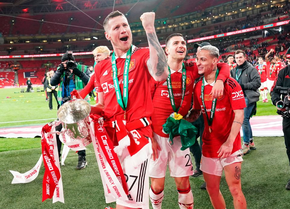 Manchester United's Wout Weghorst celebrates with the trophy after the Carabao Cup Final match at Wembley Stadium