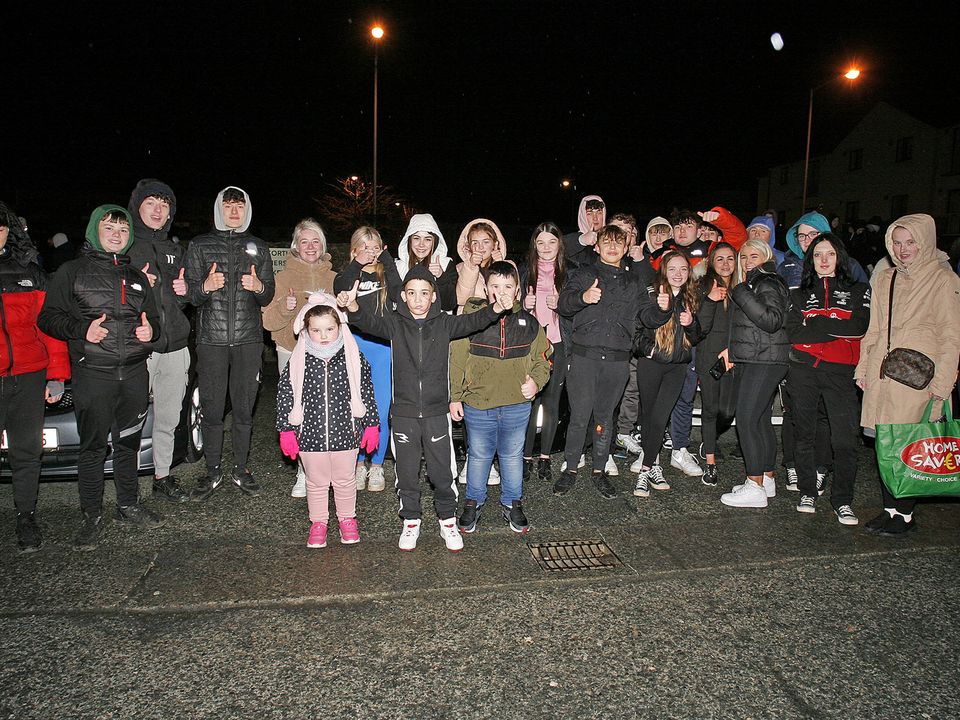 Alejandro Mizsan pictured with some of the large crowd who turned up at his homecoming car gathering at the Abbey Square on Friday evening.