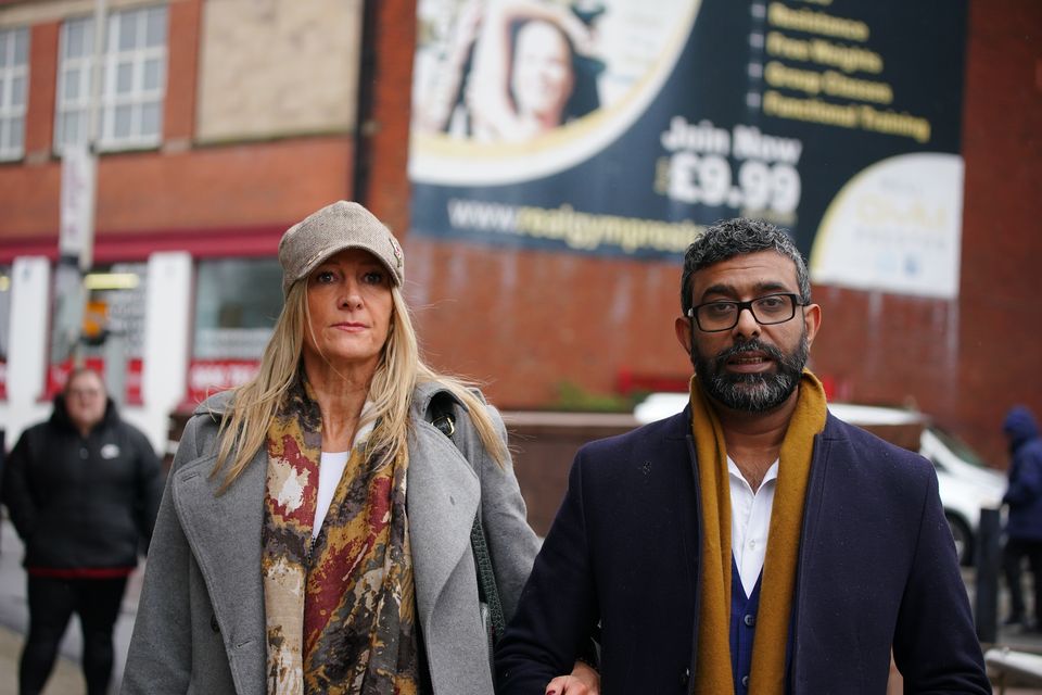 Mohammed Ramzan, who was accused of trafficking by Eleanor Williams, with his wife Nicola Holt, outside Preston Crown Court (Peter Byrne/PA)